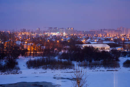 Tyumen, Russia - November 05.2016: Winter night city with the frozen riverのeditorial素材
