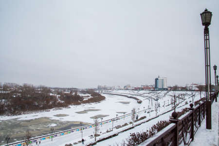 Tyumen, Russia - November 05.2016: Winter landscape with frozen river and the University Embankmentのeditorial素材
