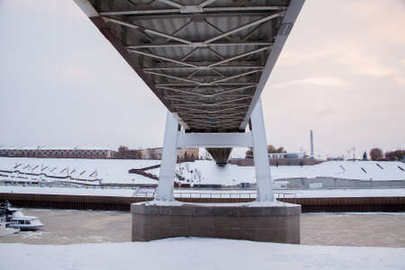 Tyumen, Russia - November 05.2016: Winter landscape at sunset with a bridge Lovers and river embankmentのeditorial素材