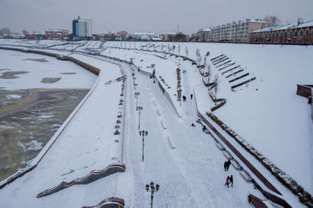 Tyumen, Russia - November 05.2016: Winter landscape with frozen river and the University Embankmentのeditorial素材