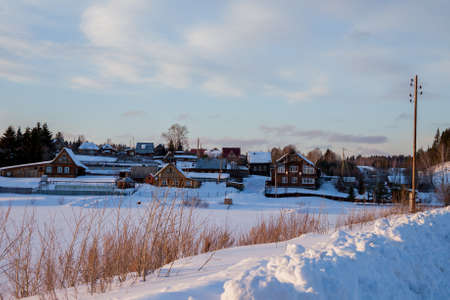 Winter rural landscape in the village of Kamenka, Sverdlovsk region, Russiaの写真素材