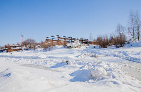 Perm, Russia - March 11.2017: An old boat on the snow in the backwaters of the Kama riverのeditorial素材