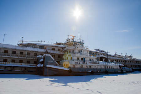 Perm, Russia-March 11.2017: Winter landscape with sailboats in the backwater of frozen river Kamaのeditorial素材