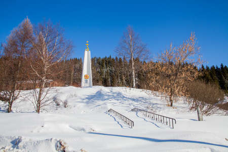 Perm Krai, Kalinino village, Russia - March 08.2017: Monument to fellow countrymen who died during the Great Patriotic War in winterのeditorial素材