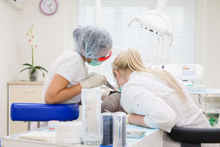 Perm, Russia - June 13.2017: Treatment of a teeth in stomatologic clinicのeditorial素材