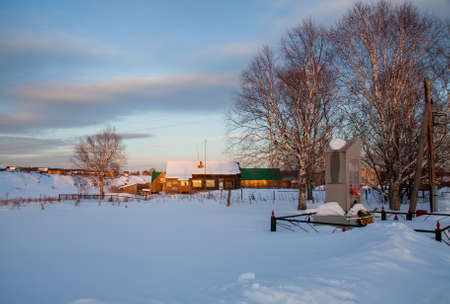 Sverdlovsk Region, Russia - March 01.2017: Monument to the Heroes of the Great Patriotic War in the village of Sloboda at sunsetのeditorial素材