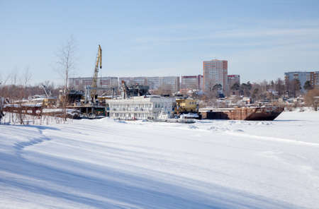 Perm, Russia - March 11.2017: Shipyard in the backwater of the Kama river in winterのeditorial素材