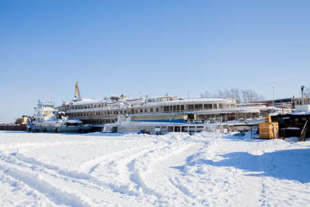 Perm, Russia-March 11.2017: Winter landscape with sailboats in the backwater of frozen river Kamaのeditorial素材