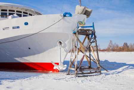 Perm, Russia - March 11.2017: Repair work of a three-deck motor ship at a winter parking in the backwaters of the Kama riverのeditorial素材