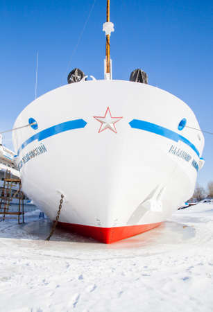 Perm, Russia - March 11.2017: Fragment of a three-deck motor ship in winter parking in the backwaters of the Kama Riverのeditorial素材