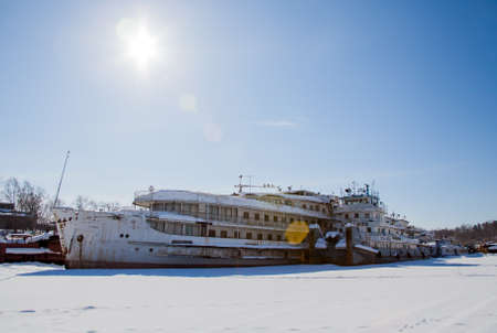 Perm, Russia-March 11.2017: Winter landscape with sailboats in the backwater of frozen river Kamaのeditorial素材