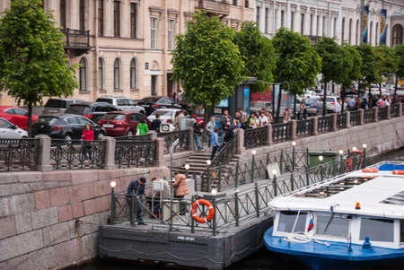 SAINT-PETERSBURG, RUSSIA - JUNE 12, 2015: People waiting to board a sightseeing boat on the river Fontanka. June 12, 2015, Russiaのeditorial素材