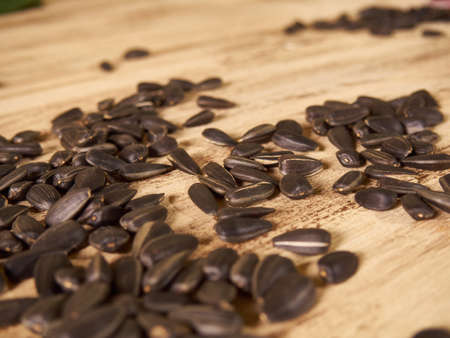 scattered wooden background sunflower seeds
