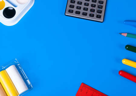 Watercolor paints and plasticine on a blue background. For children's creativityの写真素材