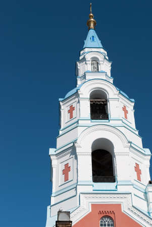 Belfry of the Christian Orthodox monastery on the background of a cloudless skyの写真素材