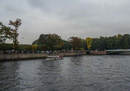 St. Petersburg, Russia - September 21, 2017: Boat with tourists sailing along the canal in St. Petersburg.のeditorial素材