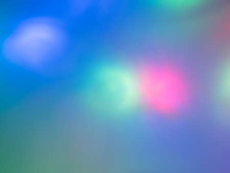 Blue blurred background with multicolored color spotsの写真素材