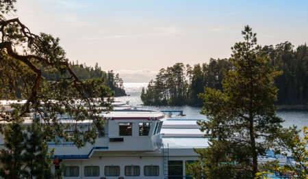 View of the cabin of the ship through the trees in natural Bayの写真素材