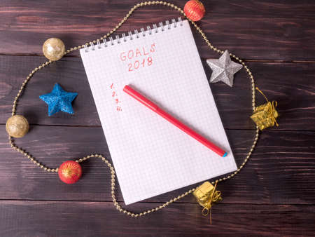 Background for Christmas card, fir branches  and ornaments, top view.の写真素材