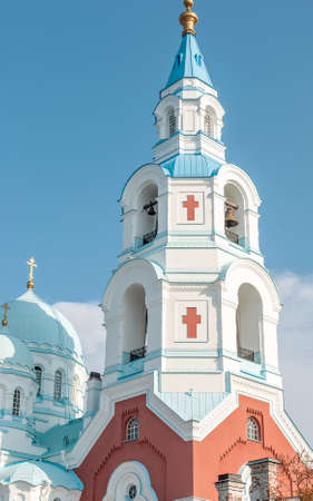 Bell tower and domes of an orthodox temple close up