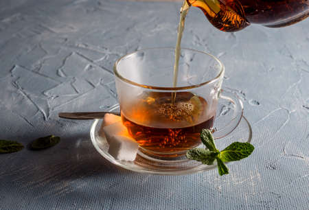 Glass cup mint tea leaves holderの写真素材