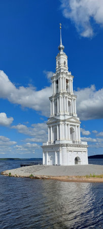 The bell tower of St. Nicholas Cathedral in Kalyazin,flooded with water, the Volga River,Russia.の写真素材