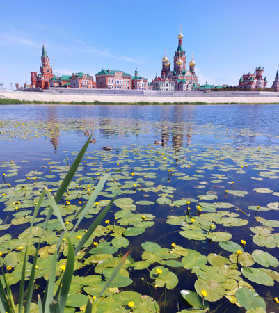 View of the Cathedral and pond with yellow water lilies, Yoshkar-ola, Russiaの写真素材