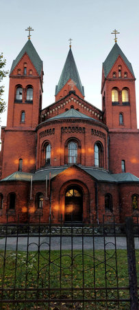 Church of the Archangel Michael in the evening in Chernyakhovsk.The old German Church.の写真素材