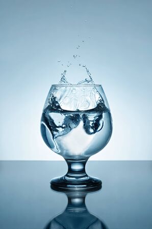 Splash in the glass, and drops the heart .Russian Federationの写真素材