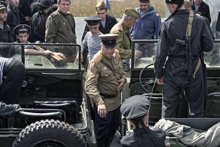 Historical festival of the Second World war to Samara, July 26, 2015. Group Jung and infantry of the red Army on the lower deck aboard the amphibious assault ship. Close-up.のeditorial素材