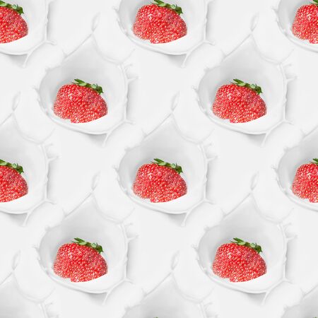 Ripe strawberries fall into the cream with a splash. Seamless backgroundの写真素材
