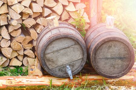 Folk production, old wooden water barrels at the historical festivalの写真素材
