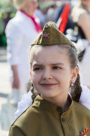 Portrait of a girl in the uniform of the Red Army, at the celebration of Victory Day. Dimitrovgrad,...