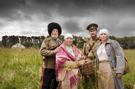 The Russian Civil War. Soldiers of the White Army and peasant women before the battle before the battle. Russia, Moscow region, Nelidovo 15 July 2017のeditorial素材