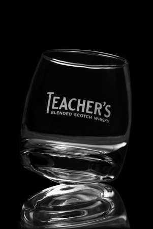 An empty glass of teachers blended scotch whisky on a black background. Russia, Ulyanovsk region, Dimitrovgrad December 1, 2015のeditorial素材