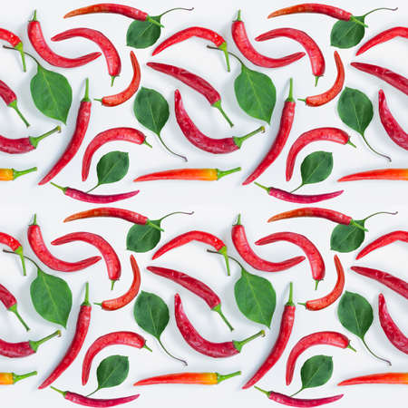 Seamless pattern with red hot chili pepper on a white background. Top viewの写真素材