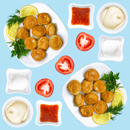 Fried Russian dumplings with three different types of sauce, lemon and tomato. Fried dumplings with meat on a light pastel blue square backgroundの写真素材