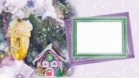 An empty text frame and a lamp in the shape of a gingerbread house on a defocused Christmas background. Selective focusの写真素材