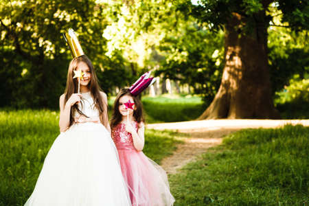 The sisters play princesses.の写真素材