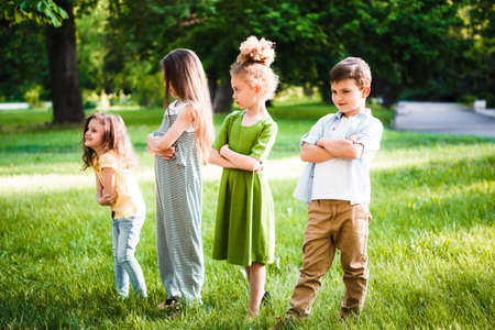 A group of children of school and preschool in the park.の写真素材