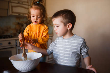 Preschoolers preparing breakfast.の写真素材