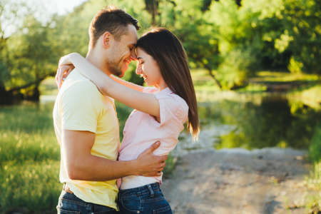 Shot of a young couple bonding trough walking in the nature.の写真素材
