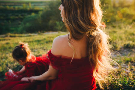 Mom and daughter are walking in nature.の写真素材