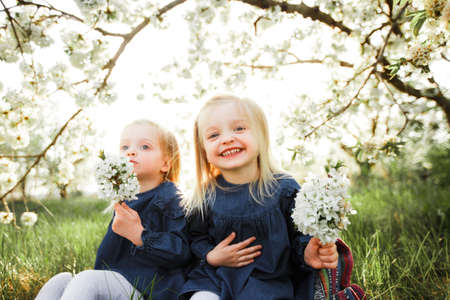 The twins are having fun in the park.の写真素材