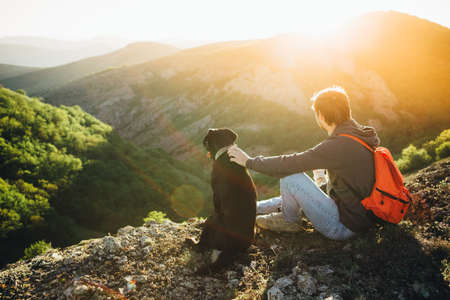 A man and a dog. The concept of the campaign.の写真素材