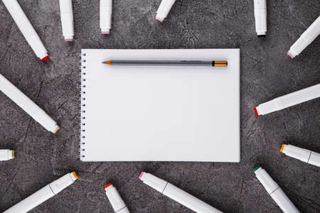 Draw in a white notebook. Space for design. Top view.