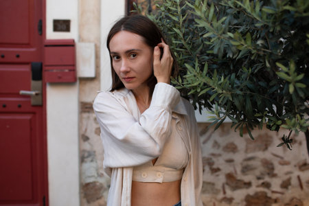 Young, stylish girl in the city. Italian street style.の写真素材