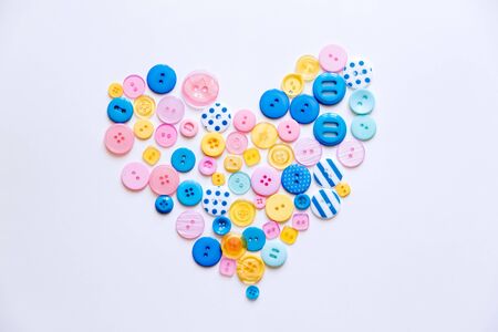 Flat lay with colorful sewing buttons, mock up, top view.の写真素材