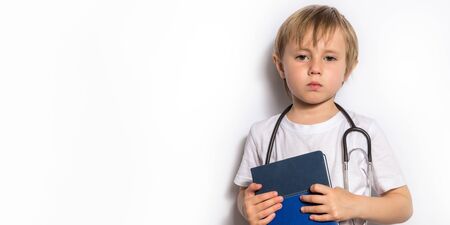 Cute Little Girl in medical mask with stethoscope isolated bannerの写真素材