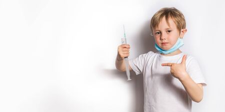 Cute Little Girl in medical mask with stethoscope isolated bannerの写真素材